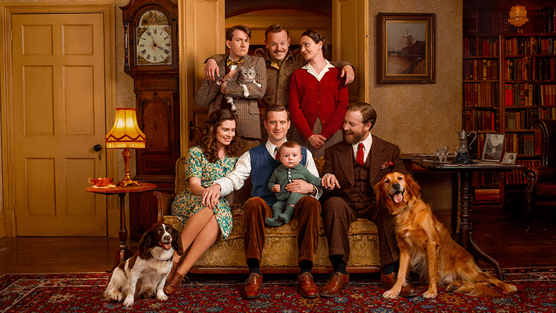 The cast of All Creatures Great and Small poses for a photo